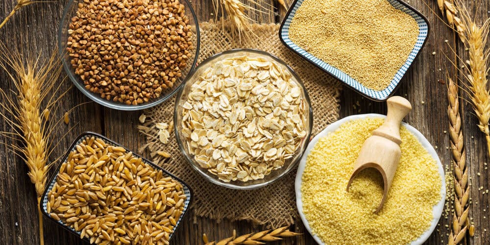 Different Bowls Of Cereal Grain- Oats, Brown Rice, Buckwheat, millet, quinoa
