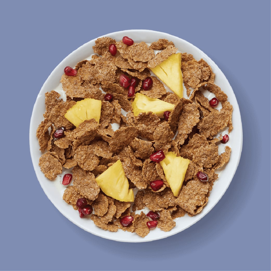 Kellogg's All-Bran Flakes Bowl with Yogurt and Chopped Pineapple